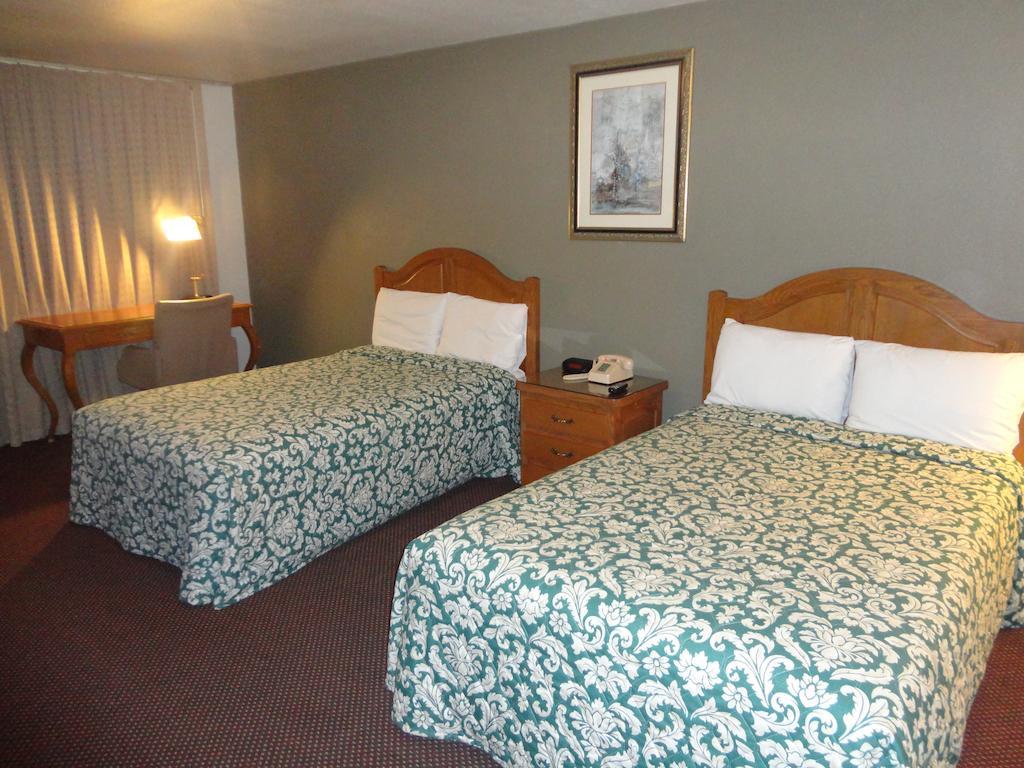 Garden Inn And Suites Silsbee Habitación foto